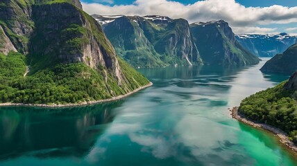 Serene fjord with emerald green waters, steep cliffs on both sides, soft clouds above