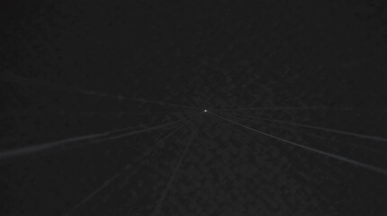 Dynamic abstract light streak trails through dark textured background, capturing motion and energy for futuristic or performance visuals. - Powered by Adobe