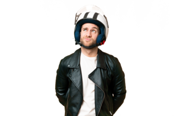 Young handsome blonde man with a motorcycle helmet over isolated chroma key background and looking up