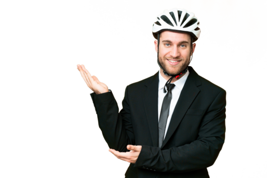 Business person with a bike helmet over isolated chroma key background extending hands to the side for inviting to come