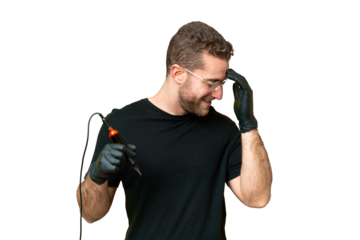 Tattoo artist man over isolated chroma key background laughing