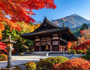 Obraz premium Autumn Colors Illuminate Tranquil Japanese Temple in Scenic Landscape