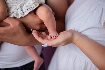Baby with fruits, vitamin C,Family, young family, father's support, family support, children, baby, baby's legs, baby's feet,