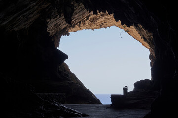 The Artá ​​Caves, overlooking a cliff and with an imposing entrance, are filled with stalactites and stalagmites. One of the stalagmites is 22 meters high. Located in Cap Vermell, Mallorca, Spain.
