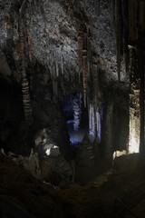 The Artá ​​Caves, overlooking a cliff and with an imposing entrance, are filled with stalactites and stalagmites. One of the stalagmites is 22 meters high. Located in Cap Vermell, Mallorca, Spain.
