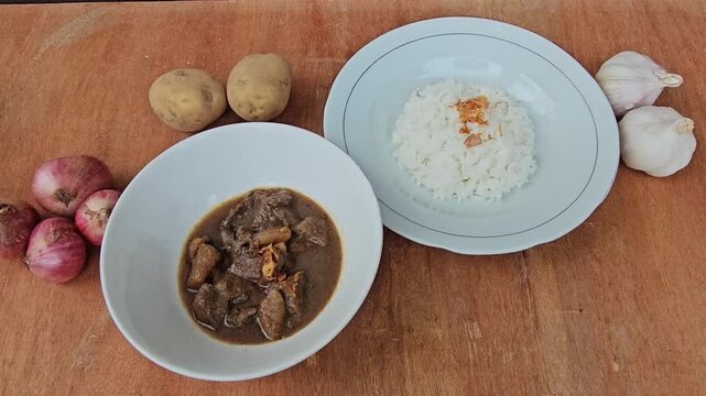 brown rice pudding,Semur daging is an Indonesian meat stew in thick brown gravy,served with steamed rice