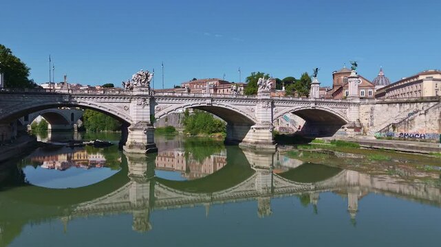 Aerial view of Rome showing the Tiber River winding through the city of ancient architecture. View of the city from above. Travelling through beautiful places of Rome. High quality footage in 4k forma