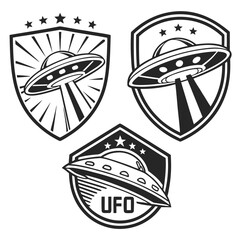 Three ufo badges isolated on white background, featuring flying saucers and stars in a vintage style design