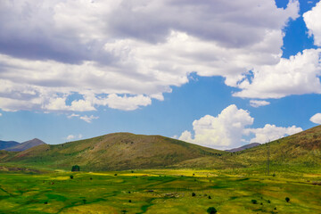 Obraz premium Beautiful Scenic Meadows and Fields on Erzurum Cat district in Turkey on a cloudy day