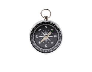 Close-up of a metallic compass with a black face and silver accents
