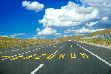 Erzurum road Sign on the road on a cloudy day