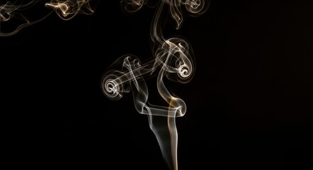 Abstract smoke swirls on black background creating hypnotic patterns