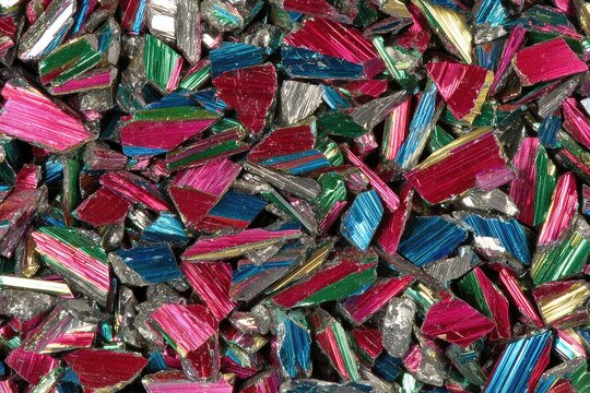 Close-up view of broken, colorful glass shards