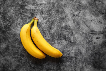 Overhead flat lay view of fresh and ripe bananas