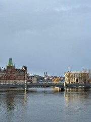 Obraz premium Stockholm Winter Skyline with Snow-Covered Historic Buildings