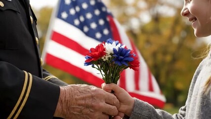 Veteran receiving flowers from child in front of American flag - Powered by Adobe