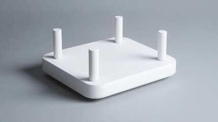 White modern Wi-Fi router with four antennas on a gray background.