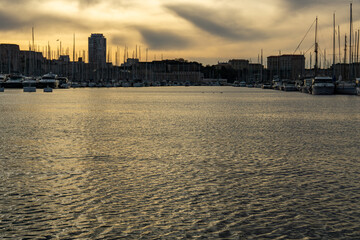 Fototapeta premium Golden Harbor Reflections