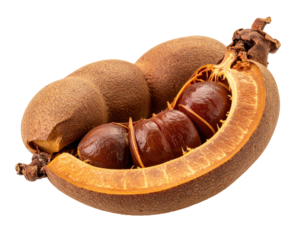 Split tropical fruit, brown and orange flesh, seeds visible