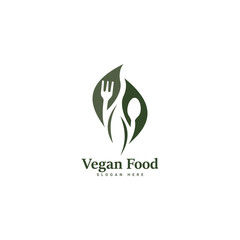Illustration of a leaf fork logo design for a vegetarian diet, eco-friendly food. A healthy vegan drink spoon and fork icon, a restaurant cafe menu symbol, and a herbal dish recipe.