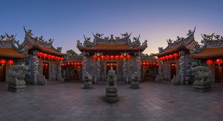 Fototapeta premium Traditional Chinese Temple Courtyard with Lanterns and Guardian Lions at Dusk