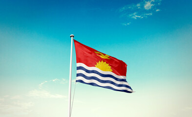 Kiribati national flag waving in beautiful sky with mast. A proud moment flag waving with sunlight.