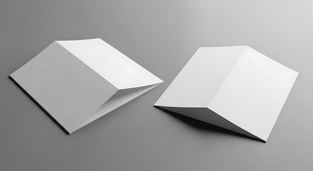 Blank Folded Papers on Gray Background.