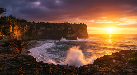 Fototapeta premium Dramatic coastal scene featuring waves crashing against rocky cliffs under a vibrant, colorful sunset sky.