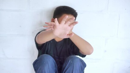 Stop abusing boy violence. child bondage , violence, terrified , A fearful child , Human Rights Day concept.