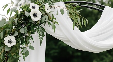 Romantic Wedding Arch with White Anemones and Flowing Fabric Detail