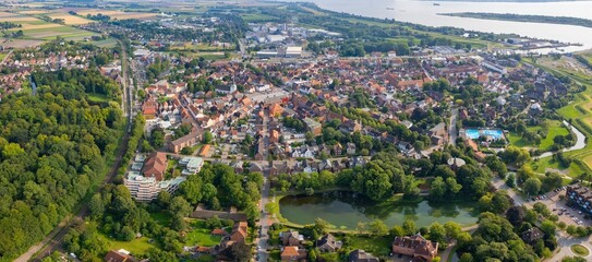 Fototapeta premium Aerial panorama of the downtown of the city Glückstadt1 in Germany on a sunny summer afternoon.
