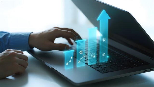 Hands interacting with a laptop displaying holographic growth charts and arrows