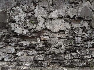 Background of very old stone wall texture photo