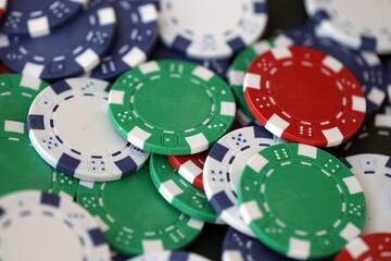Poker Table With Poker Chips Turns In Casino. Many Poker Chips Spins on the Table