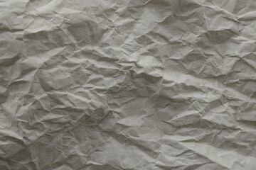 Brown crumpled recycled paper texture background. Kraft Paper