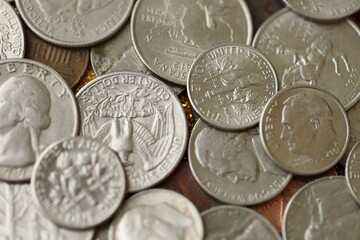 Pile with big amount of silver american cent coins as United States currency