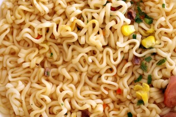 Noodles with spicy sauce and green onion chopped parts