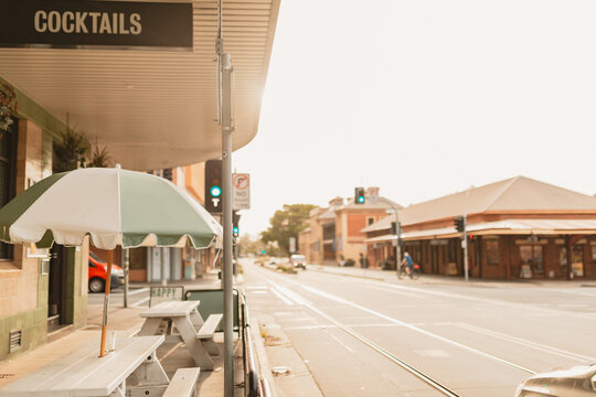 Light rail tracks running along street beside Newcastle pub