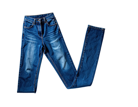 Folded pair of blue jeans on black background.  Faded denim, straight leg style,  with  distressed areas
