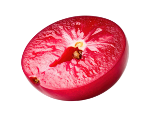 Close-up of a vibrant red berry half, showcasing juicy flesh and a seed center