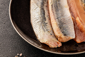 Herring fillet fish fresh seafood portion size natural product tasty snack fresh delicious gourmet food background on the table rustic top view copy space pescetarian diet