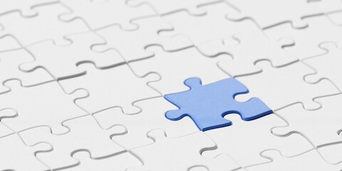 Blue jigsaw puzzle piece in the center of white jigsaw puzzle pieces background with selective focus