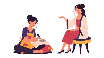 Two young women in traditional asian attire engaged in a craft activity together indoors