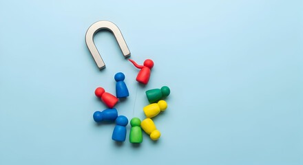 Attract top talent with strategic recruitment; a powerful magnet pulls in diverse candidates for your team, symbolizing effective hiring.