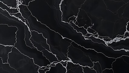 Elegant black marble with swirling gray veins, exuding luxury and sophisticated monochrome style.