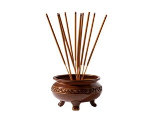 Several incense sticks in a decorative, brown ceramic bowl