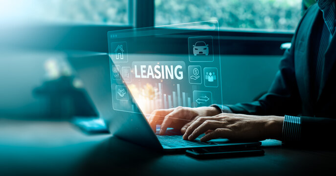 Businessman using digital leasing platform for car and property rental contract, online finance management, financial agreement, asset leasing, and modern investment service concept