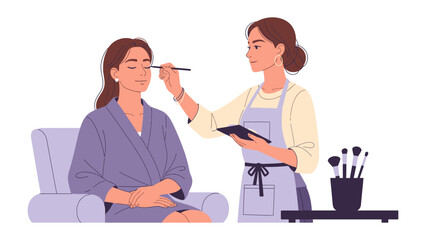 Obraz premium Professional makeup artist applying eyeshadow to a woman sitting in a chair wearing a robe for a beauty session