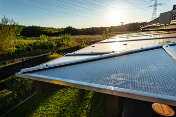 The terrace covering is visible from above, the roof is covered with polycarbonate.