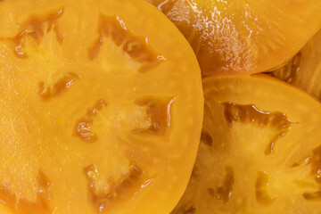 Sliced yellow tomatoes from farmers market